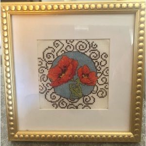 Orange/Red Handmade Cross-stitch piece framed